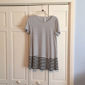 Tunic top, sized medium, fits more like a large.